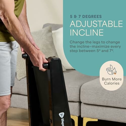 Person adjusting exercise equipment incline in living room.