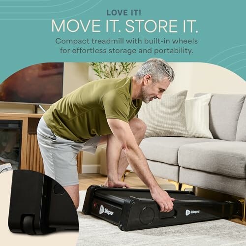 Man folding a compact treadmill for easy storage in a living room.