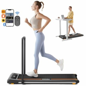 Woman jogging on a compact treadmill with remote and phone app features.