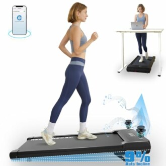 Woman using a foldable treadmill under a desk with 9% auto incline.