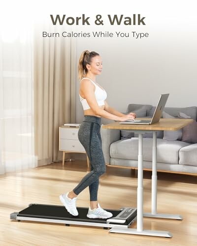 Person using treadmill desk for typing.