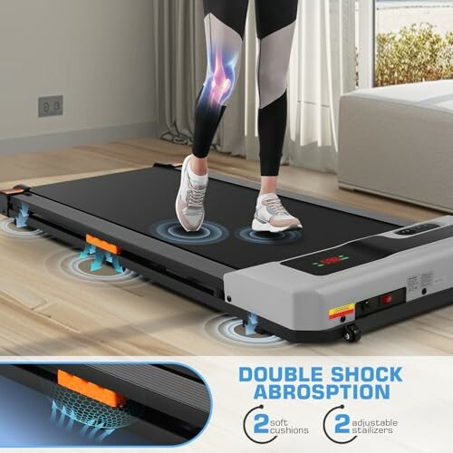 Treadmill with double shock absorption system and person walking.