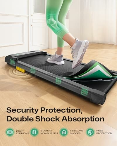 Person walking on a treadmill with double shock absorption features.