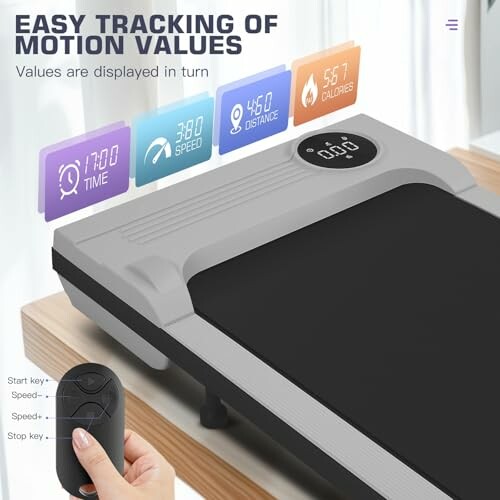 Compact treadmill with motion tracking display and remote control.