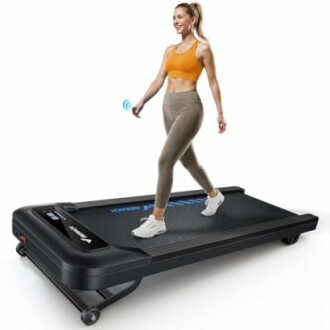 Woman walking on a compact treadmill